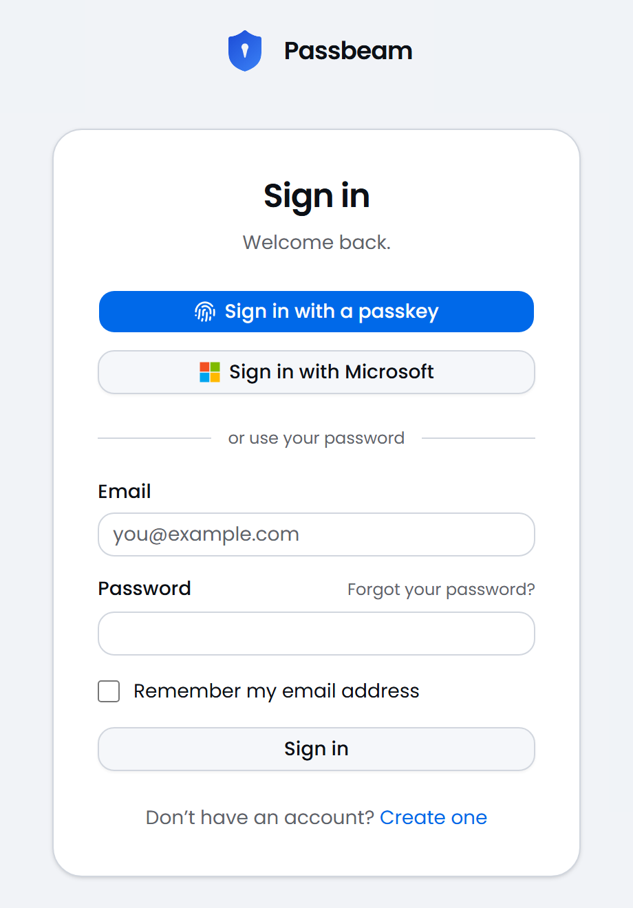 The Passbeam sign-in page with Sign in with a passkey, Sign in with Microsoft, and the email and password form.
